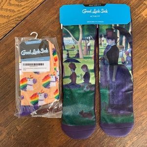 Two pair of fun GOOD LUCK SOCK socks!